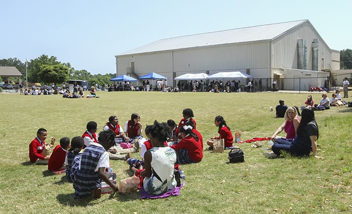 Students, from all schools and grades, break for lunch on the recess field before the finals get underway at noon. Photo By Michael Alexander