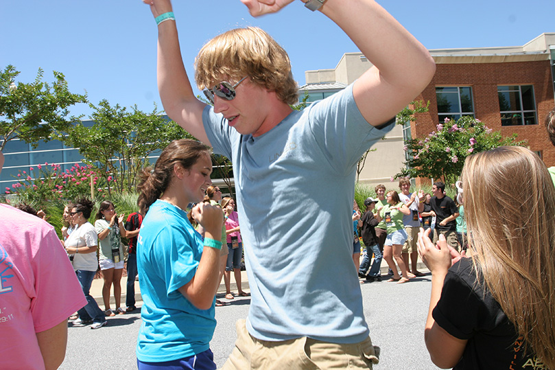 Seventeen-year-old T.J. Brodell of St. Michael the Archangel Church, Woodstock, participates in a large group dance and game called My Baby. Photo By Michael Alexander