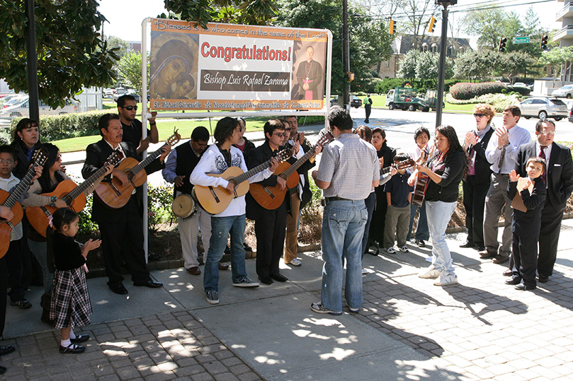 Members of St. Michael Church, Gainesville, perform songs of jubilation and praise on the Cathedral of Christ of King plaza before the episcopal ordination of Bishop Luis Zarama.