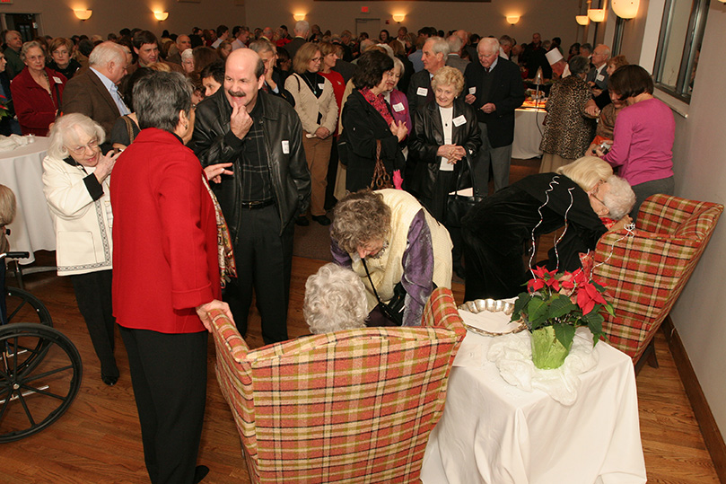 Hundreds of people pack the ministry hall at St. Jude the Apostle Church to thank and say goodbye to Sister Sally White and Sister Eileen Murray. Between the two of them they have over 80 years of service in the Archdiocese of Atlanta. Photo By Michael Alexander