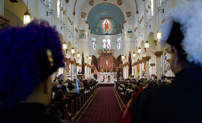 Members of the Knights of Columbus color guard prepare for the recessional as the conclusion of the Mass draws to a close. Photo by Thomas Spink