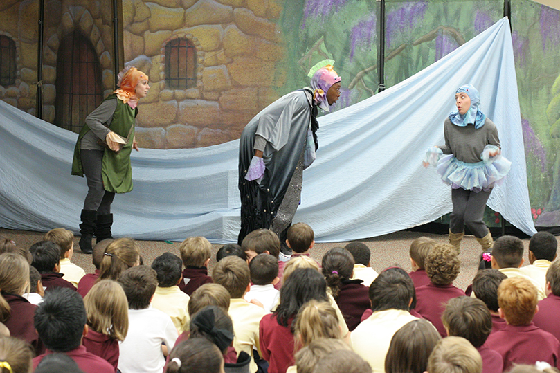 (L-r) Ann Marie Gideon, Brian Harrison and Caitlin McWethy, members of Georgia Shakespeare Festival’s Will Power Ensemble, perform “The Legend of the Sword in the Stone” for the school’s kindergarten through third grade students. Photo By Michael Alexander