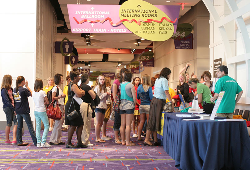 Eucharistic Congress volunteers line up to register Saturday morning. Photo By Michael Alexander