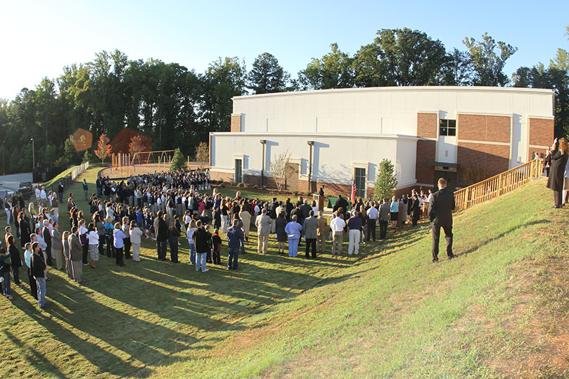 Families, students, faculty, staff and Pinecrest Academy board of directors gathered on the grounds of the new John Paul II Lower School Activities Building for its Oct. 4 dedication. Families, students, faculty, staff and Pinecrest Academy board of directors gathered on the grounds of the new John Paul II Lower School Activities Building for its Oct. 4 dedication. Photo By Michael Alexander