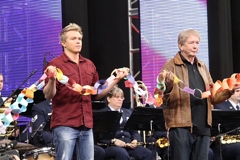 Craig, left, and Darrell Scott stand on stage where they joined the last two links of the enormous chain. Craig is the brother and Darrell is the father of Rachel Scott, the first person killed at Columbine High School on April 20, 1999. Their goal behind Rachel's Challenge is 