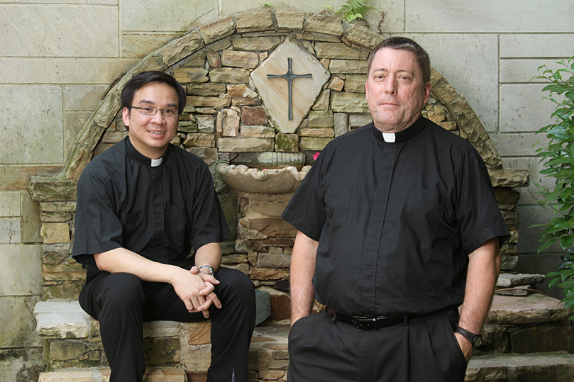 Vietnam native Father Tri Nguyen, 37, left, and Ohio native Father Mark Starr, 51, were ordained to the priesthood at the Cathedral of Christ the King, Atlanta, June 2. Nguyen’s first assignment will be at St. Peter Chanel Church, Roswell, and Starr’s first assignment will be at St. Joseph Church, Marietta. Photo By Michael Alexander