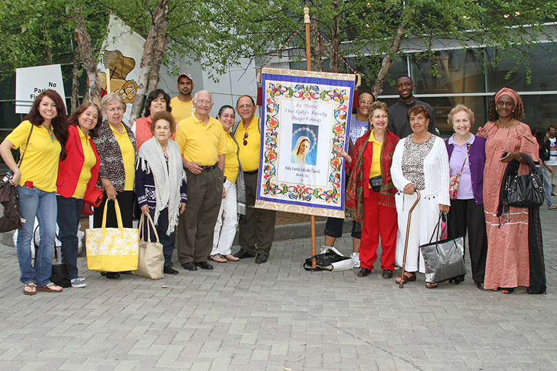 Parishioners from Holy Family Church, Marietta, gather for a parting photo at the conclusion of the Eucharistic Congress. Photo By Michael Alexander