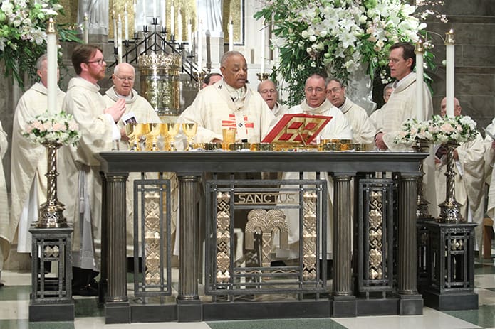 Archbishop Gregory, center, was the ordaining bishop for Bishop Talley's April 2 ordination at the Cathedral of Christ the King, Atlanta. Photo By Michael Alexander