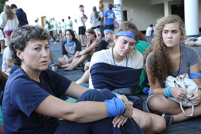 Wendy Karczewski, left, the youth minister at St. Paul Church, Pensacola, Fla., leads a small group discussion following the afternoon workshops. In addition to St. Paul Church, teens from Holy Spirit Church, St. Ann Church and Sacred Heart of Jesus Church were also on hand from the Diocese of Pensacola-Tallahassee. Photo By Michael Alexander