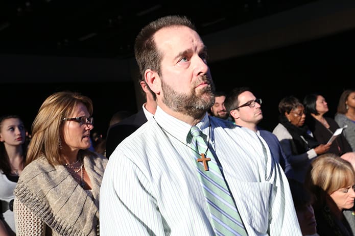 Todd Mahaffey, 53, stands with the other 15 candidates from St. Brendan the Navigator Church, Cumming. Photo By Michael Alexander