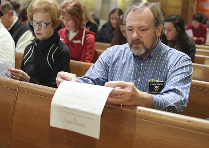 Matthew Brech of St. Brendan the Navigator Church, Cumming, participates in the consecration of the unborn to the Immaculate Heart of Mary. Photo By Michael Alexander