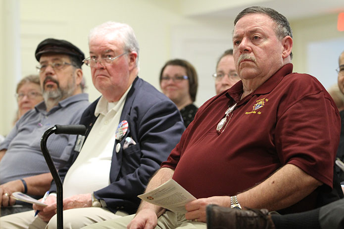 (R-l) Thomas Cox of St. Gabriel Church, Fayetteville, and Ron Mulvaney and Raymond Viernes of St. Benedict Church, Johns Creek, gather at the Shrine of the Immaculate Conception, Atlanta, with a host of others for a legislative briefing to kickoff the 2017 Catholic Day at the Capitol. Photo By Michael Alexander