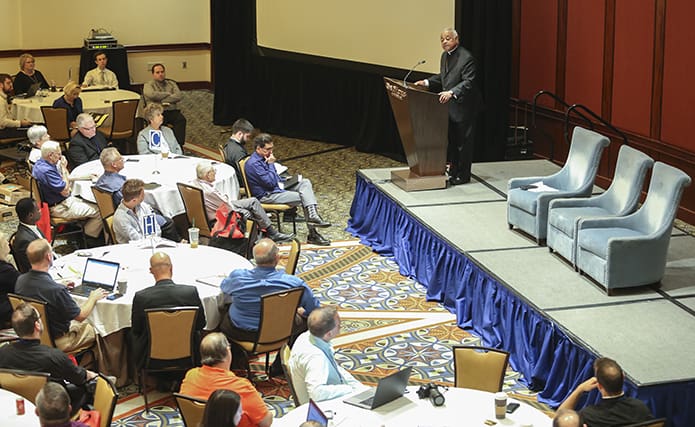 Archbishop Wilton D. Gregory, standing at the podium, was the first of two plenary session speakers, Oct. 3, at the 49th annual National Meeting of Diocesan Liturgical Commissions. The three-day meeting, cosponsored by the Federation of Diocesan Liturgical Commissions and the Bishops’ Committee On Divine Worship, was held at the Atlanta Omni Hotel. Photo By Michael Alexander