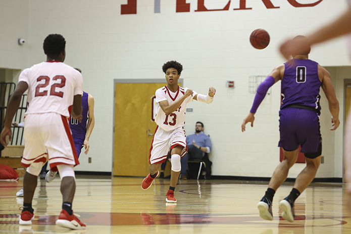 Our Lady of Mercy High School senior Jalen Dincol (#13) throws a 