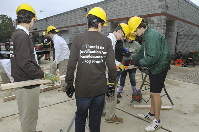 Nearly 20 Blessed Trinity High School students participated in the first build day for the tiny home project on Nov. 8. Five additional build days were scheduled before the end of 2018. Photo By Michael Alexander