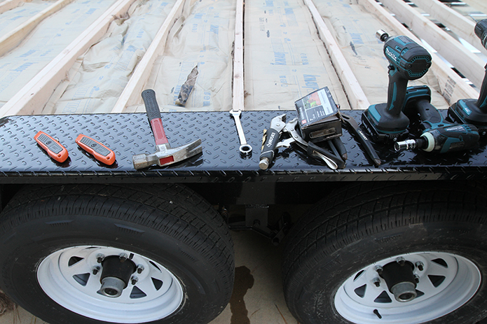 Tools rest on the side of the tiny home trailer as the student builders step away for a moment. Photo By Michael Alexander