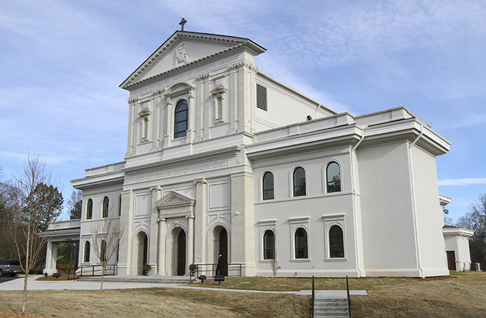 The classical architectural style of the new Mary Our Queen Church, Peachtree Corners, is captured in the hour before its doors swung open for the March 17 Mass of Dedication. The construction partners included architects Harrison Design, general contractors Whiting-Turner and Catholic Construction Services. Photo By Michael Alexander