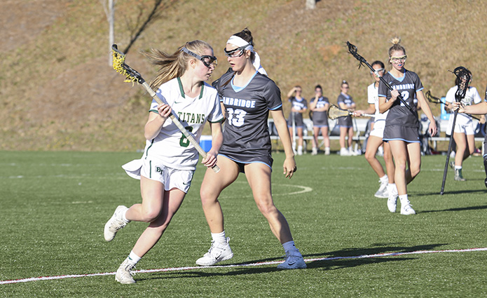 Lady Titan Lizzy Murphy (#8) scored the team's second goal of the first half from her attack position. Photo By Michael Alexander