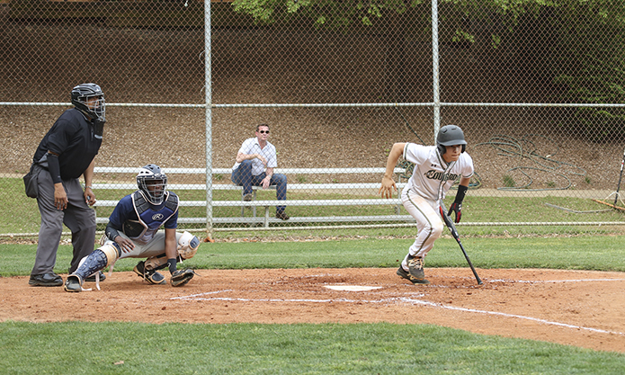 Holy Spirit Preparatory School catcher Gilberto Lajara, right, runs out of the batter’s box after getting a fourth inning base hit. Holy Spirit Prep produced four runs on six hits, and extending its lead to 7-2 during the fourth inning. When the game ended in the sixth inning, Holy Spirit Prep was a 13-3 winner over Atlanta’s Brandon Hall School in the April 25 game. Photo By Michael Alexander