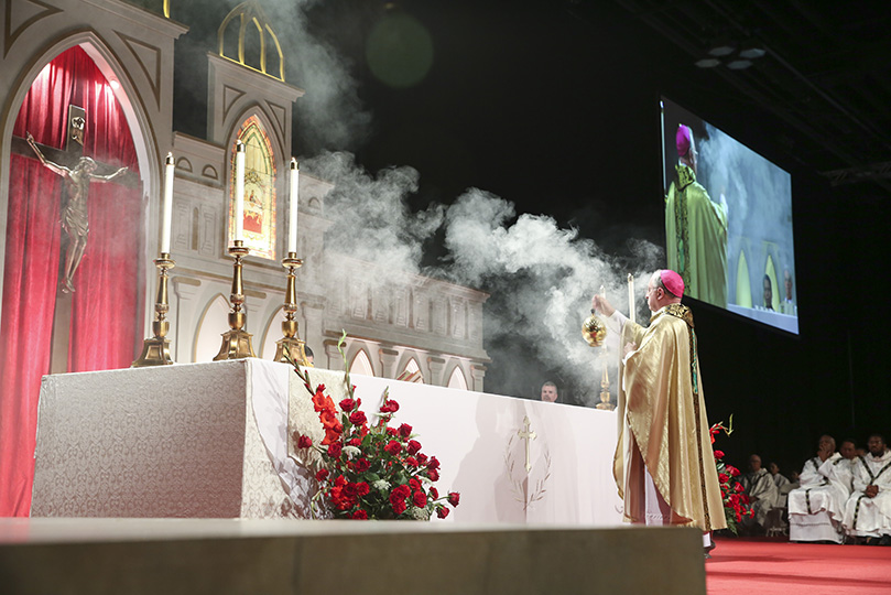 Bishop Joel M. Konzen, SM, the main celebrant and homilist for the closing Mass of the 24th annual Eucharistic Congress, censes the altar before the Liturgy of the Eucharist. Photo By Michael Alexander