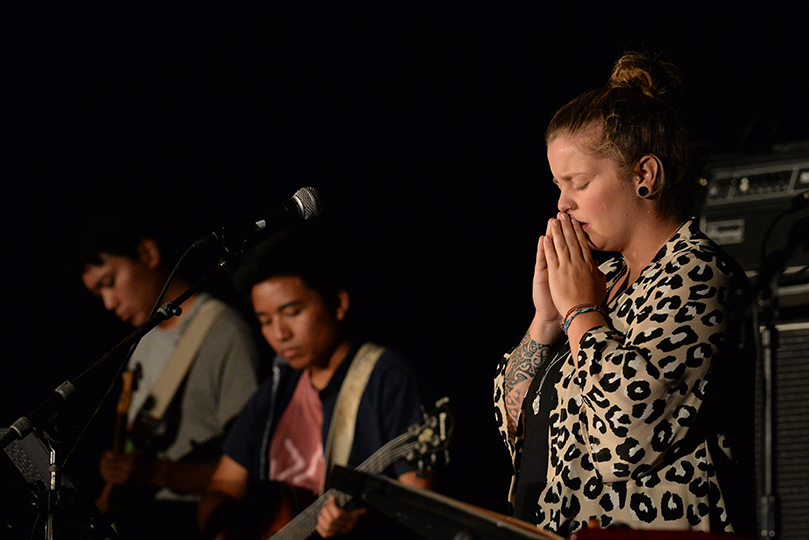 (L-r) Van and Josh Tierra and Kate Curran perform during the Revive (Young Adult) track as part of the Patrick Williams and Renew Band. The band is composed of student musicians and singers from the Georgia Tech Catholic Center, Atlanta, where Williams is the director of music. Photo By Johnny Crawford