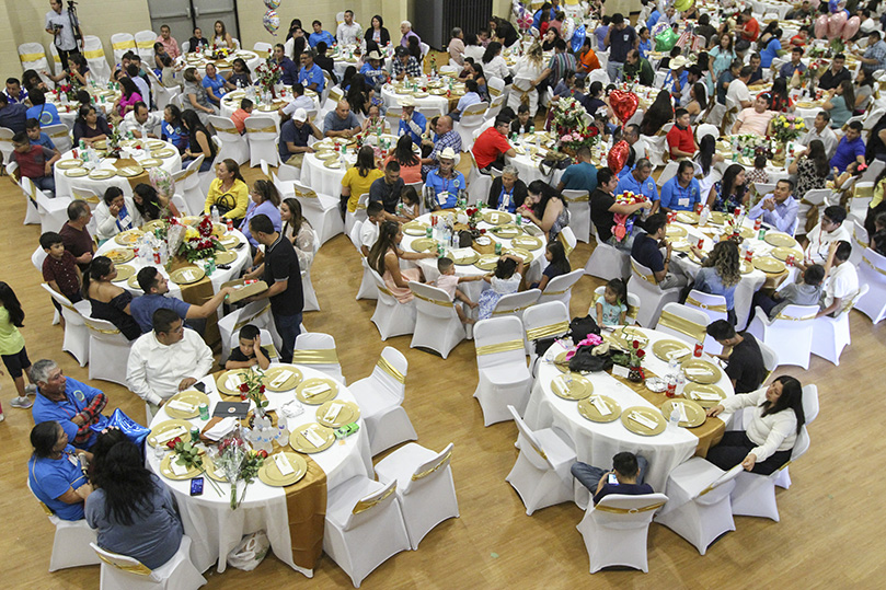 Forty-four elderly parents from Mexico were reunited with children and their families during tearful encounters and a reception at Our Lady of the Americas Mission, Lilburn. The families were treated to a meal that included fajitas (beef or chicken), rice, beans and tortillas. The parents were granted temporary visas, so they could spend 20 days with their children and their families. Photo By Michael Alexander