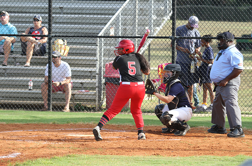 Second baseman Anjali David (#5) had a base hit in the second inning to load the bases. Photo By Michael Alexander