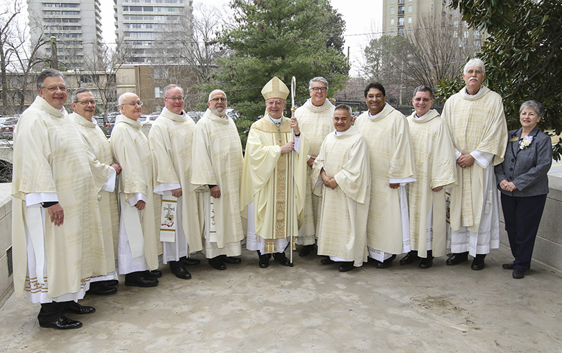 Standing on the Cathedral of Christ the King plaza for a group photograph following the rite of ordination to the diaconate are (l-r) new deacons James Grebe, Igor Ponce, Joseph Odom Jr., and William Kester, Deacon José Espinosa, associate co-director of formation, Bishop Joel M. Konzen, SM, the diocesan administrator, Deacon Dennis Dorner, permanent diaconate director, new deacons David Hernández, Dev Lobo, James Windon and Bruce Goodwin and Penny Simmons, associate co-directors of formation. Photo By Michael Alexander