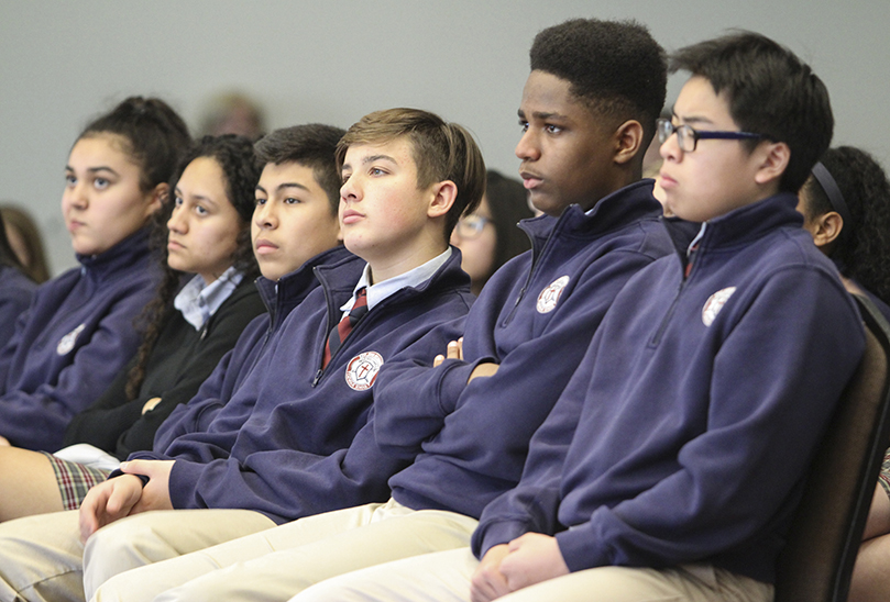 St. John Neumann Regional School eighth-graders (r-l) Johnny Ho, Ronnie Stephens, Paul Zakis, Eduardo Ramos, Georgia Guadamuz, and Abigail Vega attend the first 