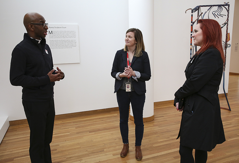 (Clockwise, from right) Jayna Hoffacker, program coordinator for the Archdiocese of Atlanta’s Justice and Peace Ministries, Father Desmond Drummer, pastor of Most Blessed Sacrament Church, Atlanta, and chaplain at Our Lady of Mercy High School, Fayetteville, and Kate McLeod, head of school and teacher services for the High Museum, Atlanta, meet each other for the first time in person. All three collaborated with each other for the Stations of the Cross at the High project. Photo By Michael Alexander