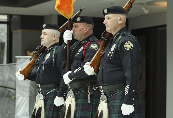 (L-r) Andrew Fincher, Scott Priestly and Mike Flisser, members of the Metro Atlanta Police Emerald Society (MAPES) honor guard, were present for the Father O’Reilly memorial ceremony. With a membership of over 350, MAPES has been around since 1997 as a non-profit organization promoting Gaelic heritage. Photo By Michael Alexander