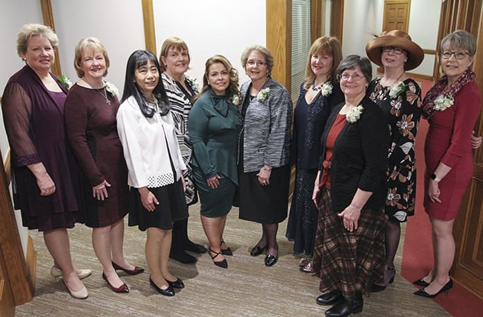 During the rite of ordination, the wives of the permanent diaconate candidates processed in with the dalmatics and stoles, and they participated in the offertory procession of gifts. They include (l-r) Kathy Schmidt, Loretta Boyd, Ikumi Buckley, Kathy Wolf, Ana Agudelo, Teresa Echevarria, Kelly Schreckenberger, Cissy Hogan, Suzanne Fragale and Carol Ranft. Photo By Michael Alexander