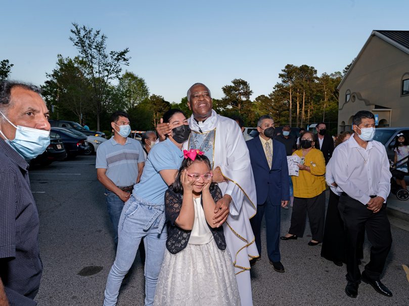 Bishop-designate Jacques E. Fabre-Jeune, CS, spends time with parishioners following the Mass at San Felipe de Jesús Mission. Photo by Johnathon Kelso