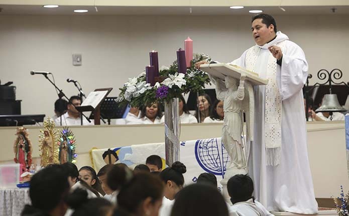 Parochial vicar Father Victor Códova González, a native of Mexico, was the homilist for the Dec. 11 Mass on the eve of Our Lady of Guadalupe’s feast day. In his homily Father González said that Our Lady of Guadalupe is the Mother of God, our mother in Mexico and she’s the mother of all people. Photo By Michael Alexander