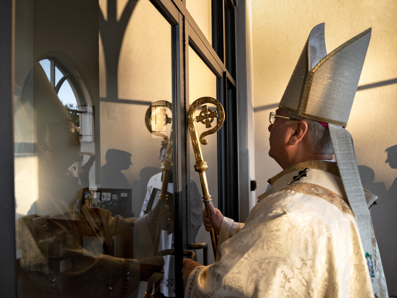 DAWSONVILLE, GA - NOVEMBER 1, 2021: Archbishop Gregory J. Hartmayer, OFM Conv., begins the dedication service at Christ the Redeemer Church. Photographer: Johnathon Kelso