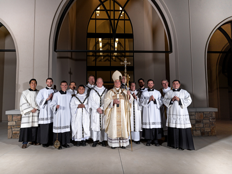 DAWSONVILLE, GA - NOVEMBER 1, 2021: Archbishop Gregory J. Hartmayer, OFM Conv., photographed with the priests, deacons, and seminarians following the dedication service at Christ the Redeemer Church. Photographer: Johnathon Kelso