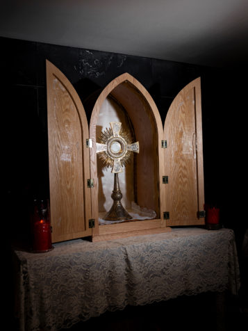 A monstrance holds the exposed host inside the adoration chapel at Corpus Christi Church. Photo by Johnathon Kelso