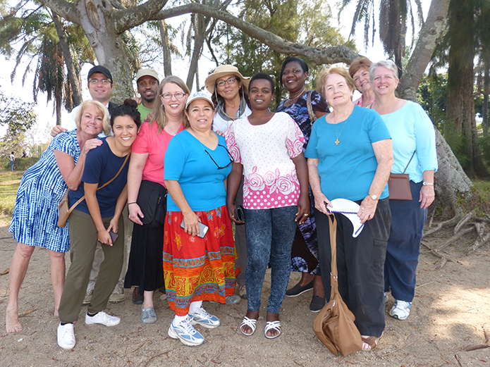 Members of the CRS delegation to Rwanda in September were, front from left, Kathy Montag of the Archdiocese of Atlanta; Kayla Jacabs, Diocese of Joilet, Illinois; Beth Knobbe, Archdiocese of Chicago, Illinois; Norma Valdez, Diocese of San Antonio, Texas; Fabian Dayitare, Diocese of Kigali, Rwanda; Sister Patricia Brown, Diocese of Savannah; Ann Pickney, Diocese of Savannah; and back row from left, Father Pablo Mingnone, Diocese of Savannah; Ashley Morris of Archdiocese of Atlanta; Claudia Molina, Diocese of Joliet; Pascasie Musabyemungu, Diocese of Kigali; and Lori Tracey, Diocese of Joliet.