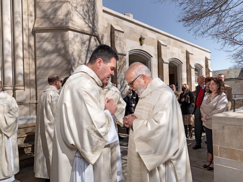 Deacon Rodney Arion blesses Deacon Jose Espinosa, co-director of diaconate formation following the Mass of Ordination to the Permanent Diaconate at the Cathedral of Christ the King Feb 5. Photo by Johnathon Kelso