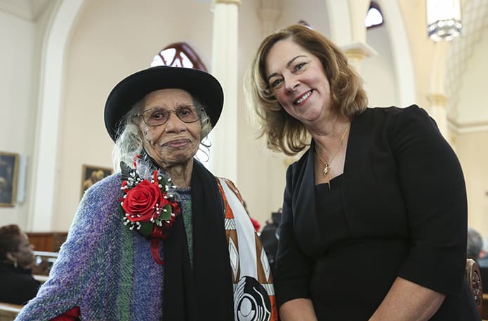 Emily Milner, left, poses with her physician assistant of 20 years from Atlanta’s Piedmont Hospital, Julie Tocci, PA. Tocci, a member of Holy Spirit Church, Atlanta, who was on hand for the Jan. 14 Mass at the Shrine of the Immaculate Conception. They saluted Milner’s most recent birthday, making her a parish centenarian. Photo By Michael Alexander