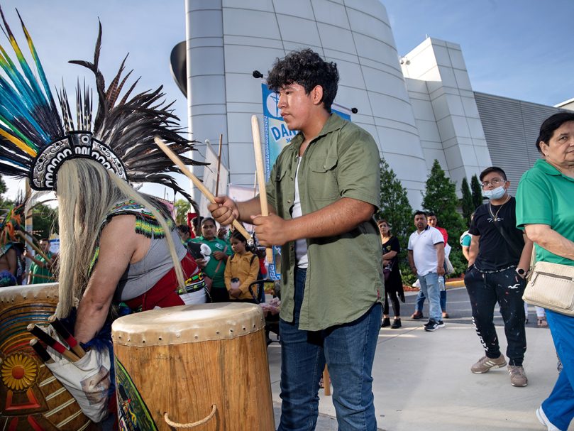 An Aztec dance group that represents four parishes in the Atlanta area performs before the Saturday morning procession at the Eucharistic Congress. Photo by Johnathon Kelso