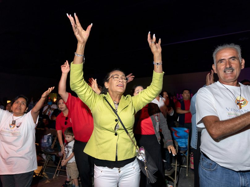 The faithful worship as a band plays at the Spanish Track program on the second day of the 25th Eucharistic Congress. The event was held at the Georgia International Convention Center in College Park. Photo by Johnathon Kelso