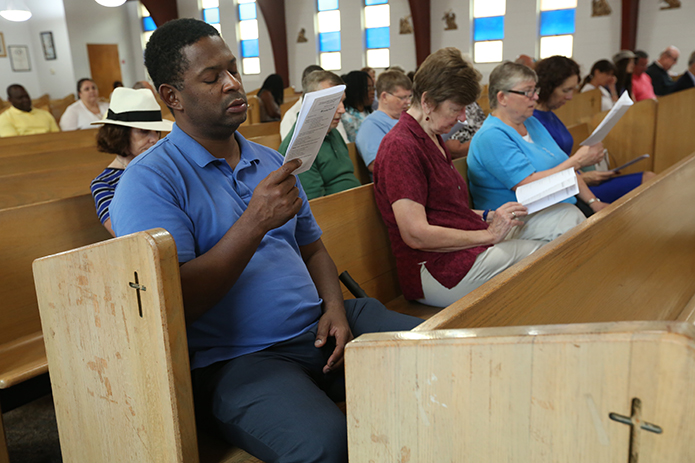 (Front row, l-r) Marc Bennett of Our Lady of Lourdes Church, Atlanta, Sinsinawa Dominican Sisters Kathy Komarek and Pam Mitchell and Kerry McGrath, an associate of the Sinsinawa Dominican Sisters, participate in the evening prayer service for St. Dominic on his feast day, August 8. Photo By Michael Alexander