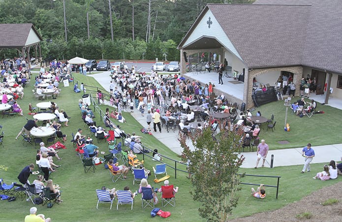 A celebration followed the Mass at St. Benedictâs Taylor Lodge. There was food, entertainment and line dancing. Photo By Michael Alexander