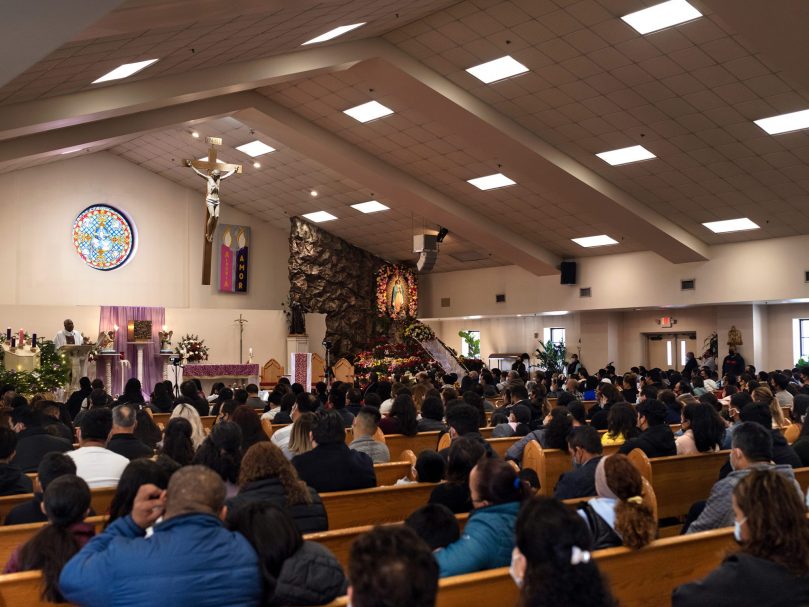 Parishioners gather for morning Mass at San Felipe de Jesús Church on the feast of Our Lady of Guadalupe. Photo by Johnathon Kelso