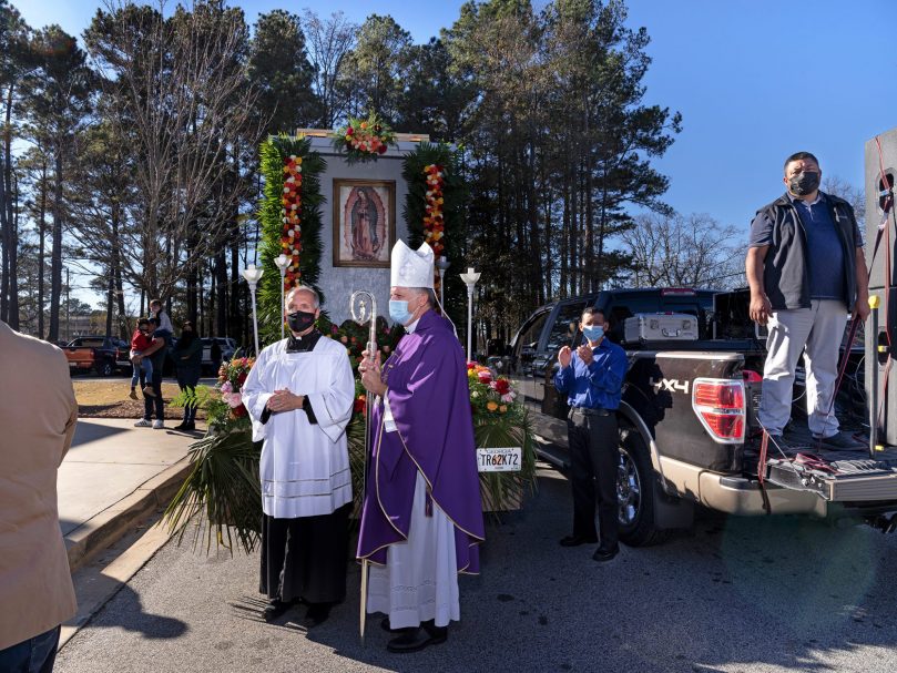 Bishop Bernard E. Shlesinger III follows the procession of Our Lady of Guadalupe into San Felipe de Jesús Church for afternoon Mass on Dec. 12. Photo by Johnathon Kelso