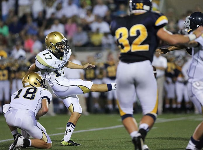 St. Pius X kicker (#17) Michael Matthewsâ field goal attempt is blocked in the first half, but he was redeemed when he kicked the game winning field goal with 20 seconds remaining in the game. The victory gave Marist School its first loss of the season. Photo By Rob Buechner