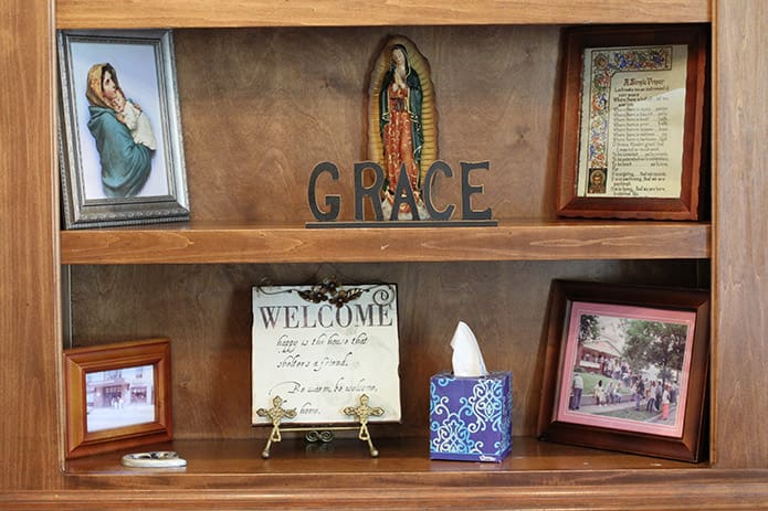 Grace is one of the words found on shelf in the room where the residents at GraceWay Recovery Residence for Women come together for group sessions. Other words prominently displayed on the shelf are faith, hope, love, peace and trust. Photo By Michael Alexander