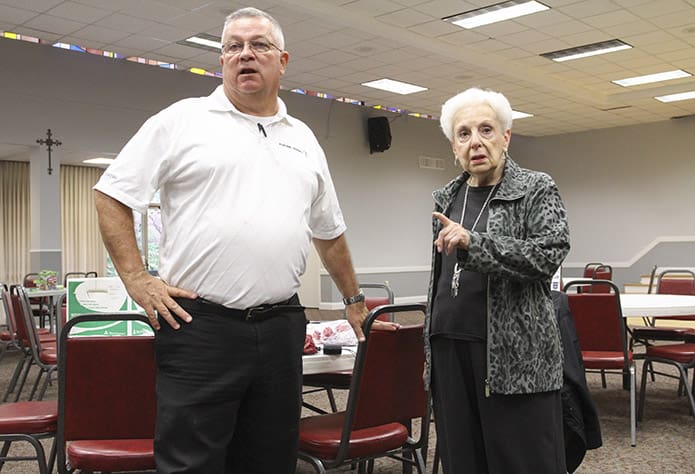 Bob Spidel, left and Eleanor Camarata head up Holy Cross Churchâs Troop Support Ministry, which began in Oct. 2008. Photo By Michael Alexander