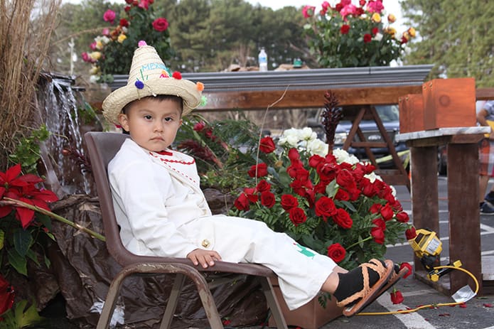 Even though he may not be sure what all the fuss is about, four-year-old Jonathan Cortez is dressed the part during the Dec. 12 Our Lady of Guadalupe feast day celebration at Our Lady of the Americas Mission, Lilburn. Photo By Michael Alexander